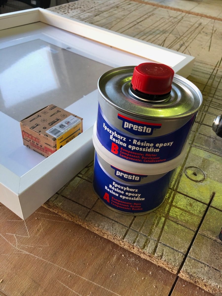 Epoxy (also called resin) is going to be used to fix the broken espresso cups to the wooden plate.
