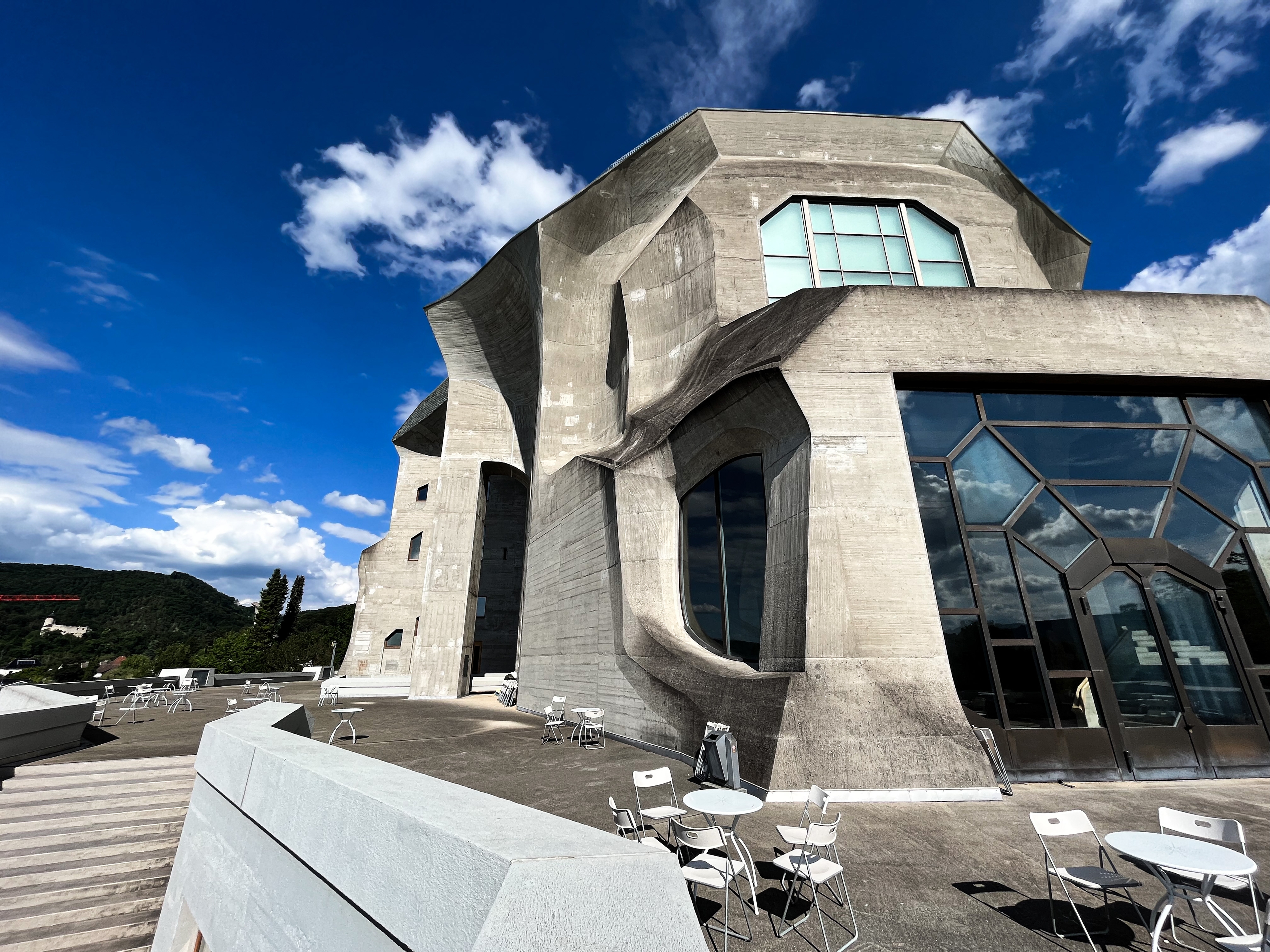 It is a brutalistic building, made from concrete and wood. The anthroposophical movement tries to combine science and spirituality.