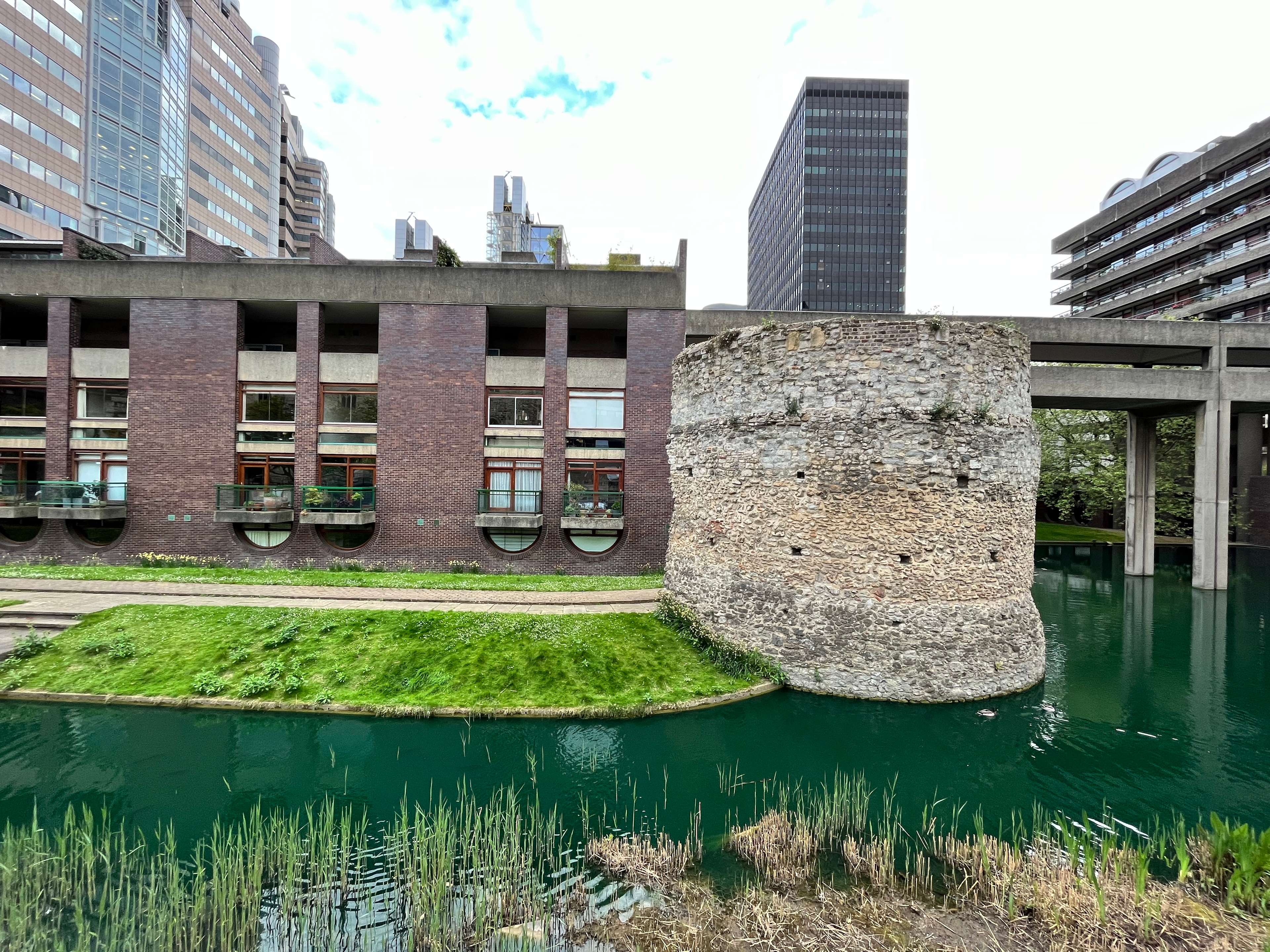 I love the combination of its rugged concrete and the lush greenery.